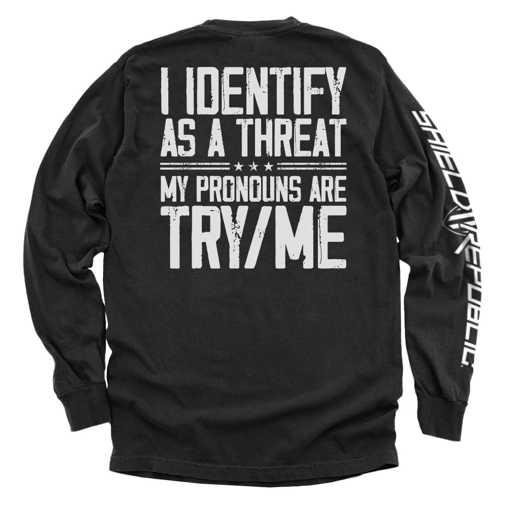 I Identify As A Threat Shirt featuring bold rugged typography on black background, promoting strength and independence.