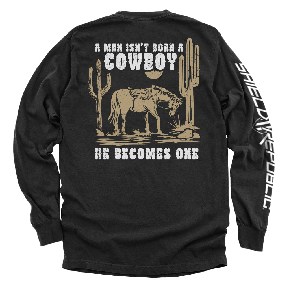A Man Isn't Born A Cowboy Hoodie