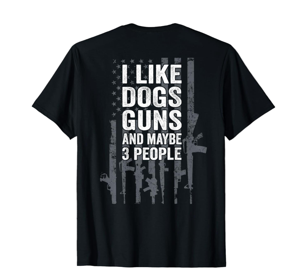 Black t-shirt with white text 'I LIKE DOGS GUNS AND MAYBE 3 PEOPLE' on a white background