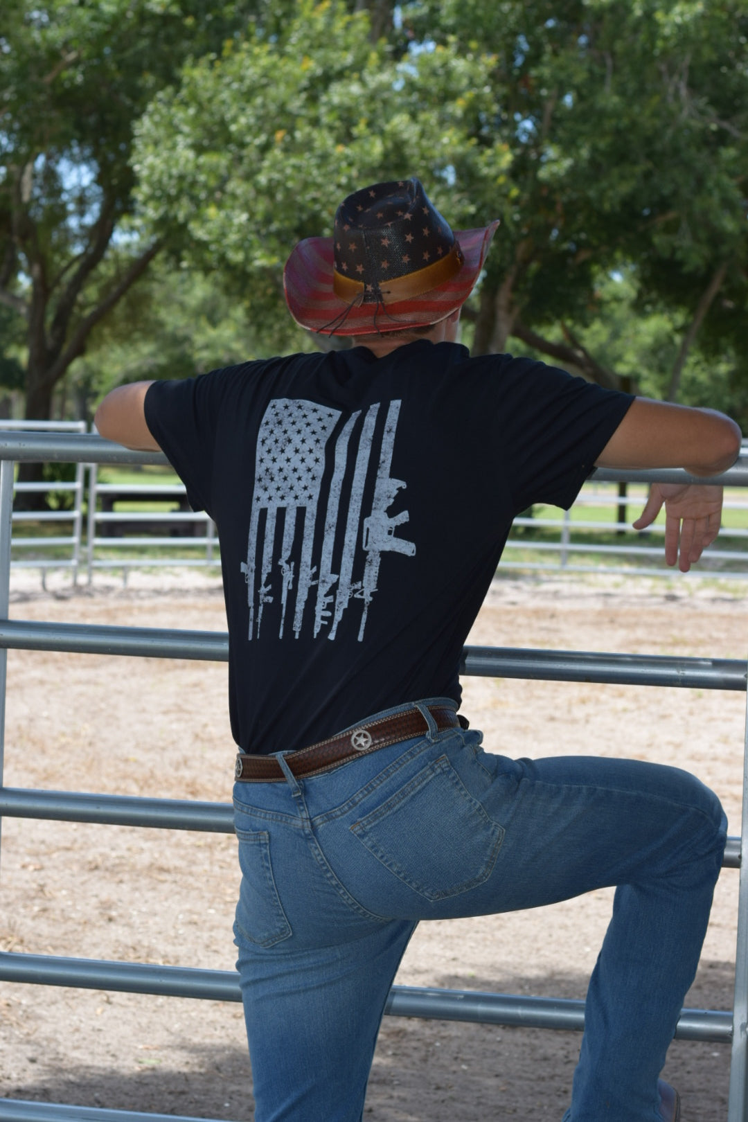 Man in jeans and cowboy hat wearing Southern Style Apparel t-shirt