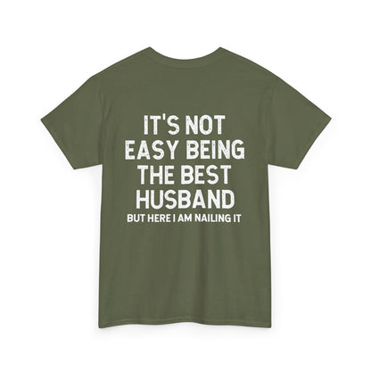 Not Easy Being the Best Husband Shirt – Funny husband tee showcasing humorous text on an olive green background.