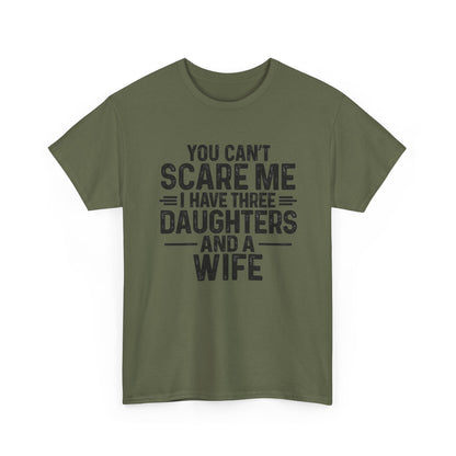 You Can't Scare Me I Have Three Daughters And A Wife Shirt in olive green with bold, distressed lettering.