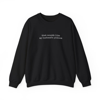 That Sounds Like My Husband's Problem Sweatshirt in black with white typewriter-style text.