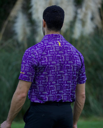 Man wearing Baton Rouge football polo shirt by Haven Golf with purple Play Neck design.