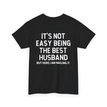 Not Easy Being the Best Husband Shirt - Funny husband tee with humorous text on a black background.
