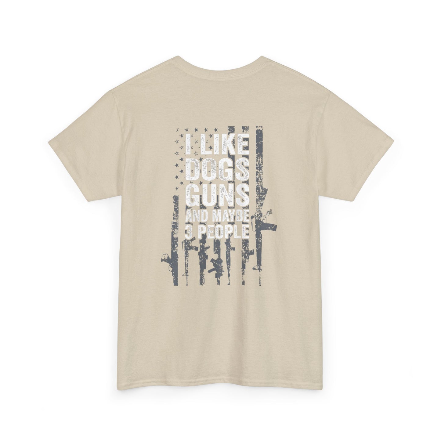 I Like Dogs Guns and Maybe 3 People T-Shirt with humorous graphic and text on beige background.