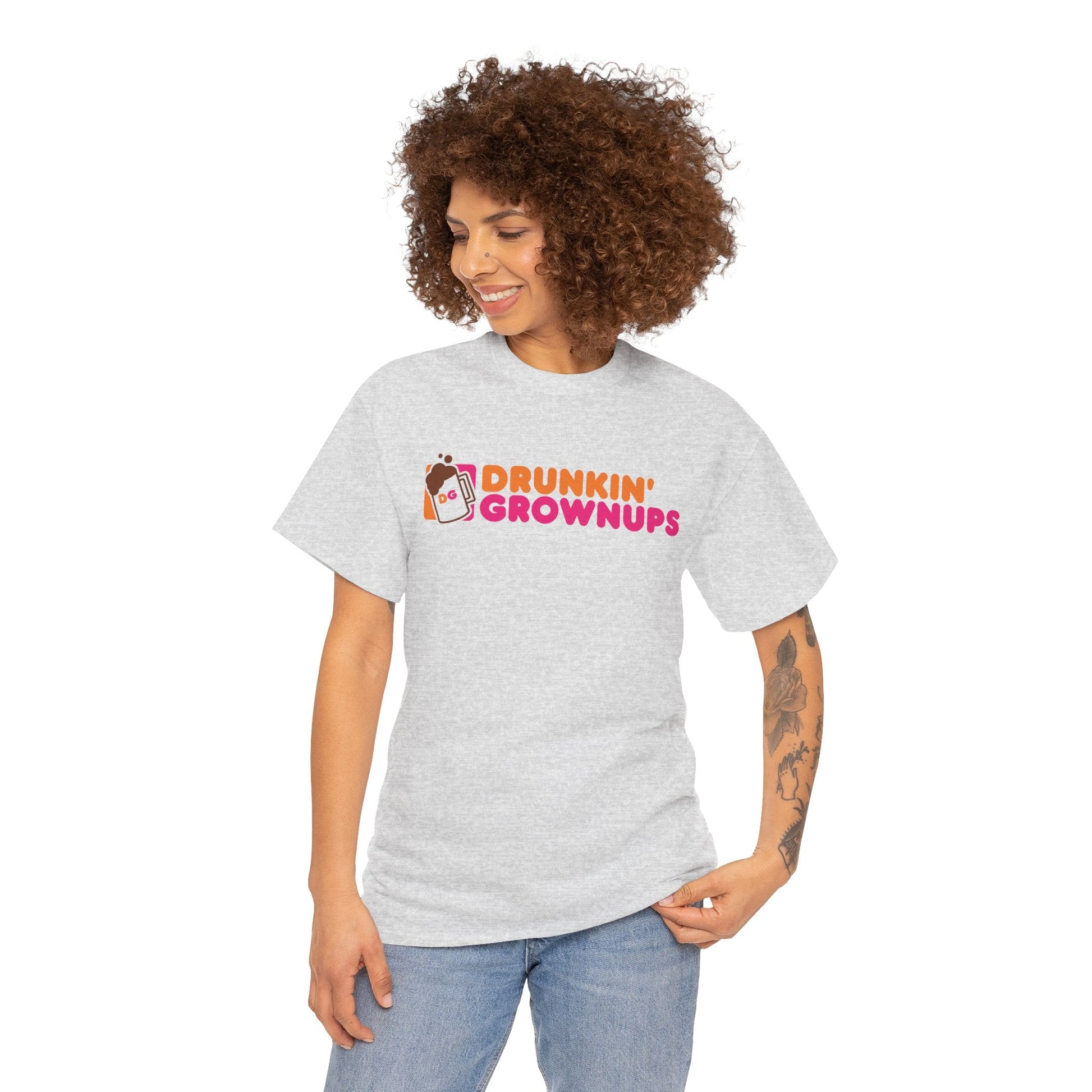 Woman wearing a grey Drunkin Grownups Shirt, featuring a funny party graphic, perfect for tailgates or BBQs.