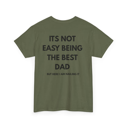 Not Easy Being The Best Dad But Here I Am Nailing It Shirt back view in olive green with bold text design.
