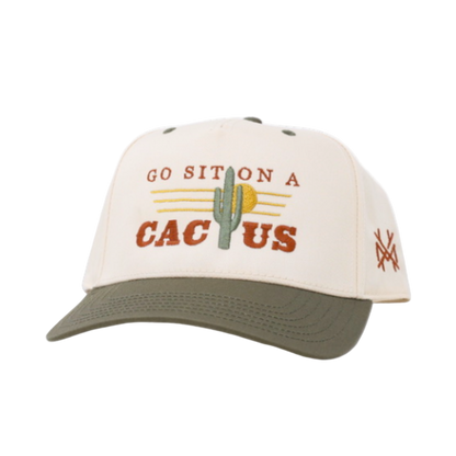 Cap with 'Go Sit on a Cactus' text and cactus graphic on a white background