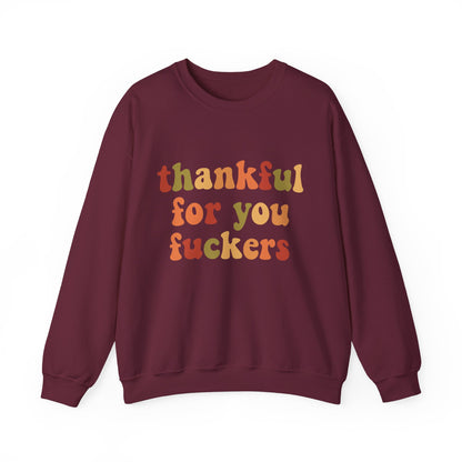 Thankful For You Fckers Sweatshirt in burgundy with colorful text design.