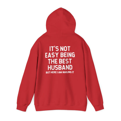 Best Husband Hoodie with white lettering saying "It's Not Easy Being The Best Husband But Here I Am Nailing It"