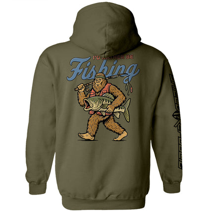 I’d Rather Be Fishing Bigfoot Shirt featuring Bigfoot with fishing rod and catch, funny fishing graphic tee for anglers.