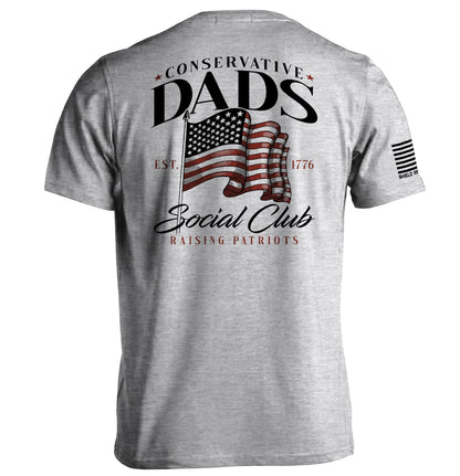 Gray t-shirt with 'Conservative Dads Social Club' text and American flag graphic design on the back.