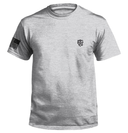 Gray Spilling the Tea Since 1773 T-Shirt with American flag sleeve design and vintage style graphic.