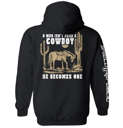 A Man Isn't Born A Cowboy Hoodie