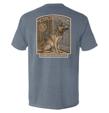 The Original Homeland Security Dog T-Shirt featuring vintage style illustration of a loyal working dog on a patriotic tee.