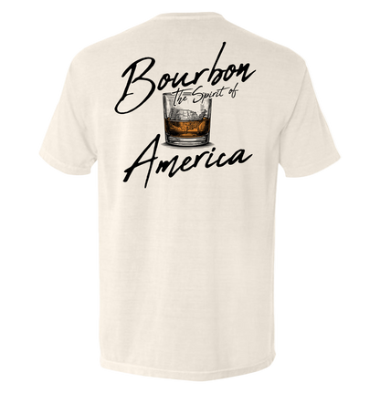 Beige t-shirt with 'Bourbon the Spirit of America' text and whiskey glass graphic on a white background