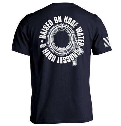 Raised On Hose Water & Hard Lessons Shirt in black with nostalgic design, perfect for blue collar style lovers.