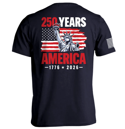 250 Years Statue of Liberty Shirt featuring 1776–2026 America 250 design with the Statue of Liberty and American flag backdrop.