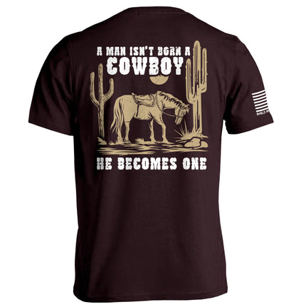 A Man Isn't Born A Cowboy Hoodie