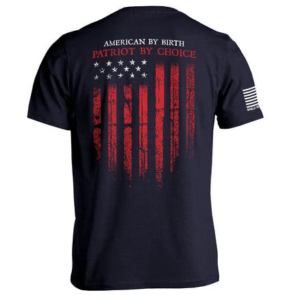 Patriot shirt American flag tee with distressed flag graphic and slogan "American By Birth, Patriot By Choice."
