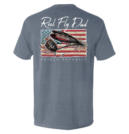 Reel Fly Dad Fishing American Flag T-Shirt featuring Shield Republic design, perfect for fly fishing enthusiasts.