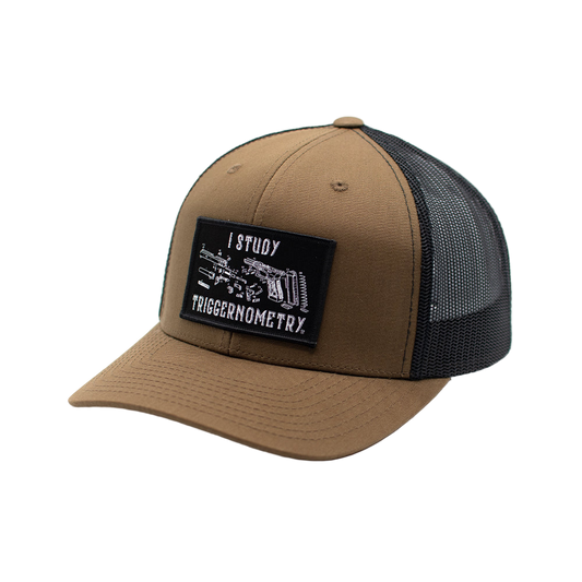 Brown trucker cap with black mesh back and a patch on a white background