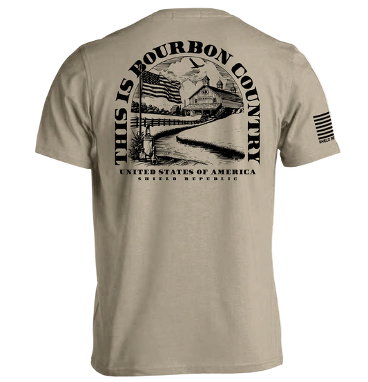 Beige t-shirt with black graphic and text on a white background