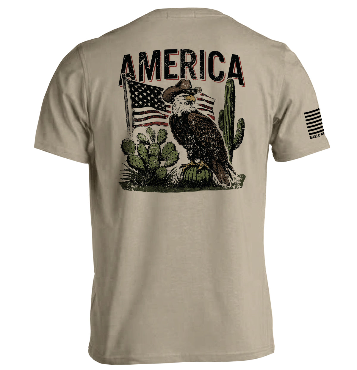 America Eagle Western T-Shirt with eagle and flag design in desert scene, showcasing classic patriotic style on beige fabric.
