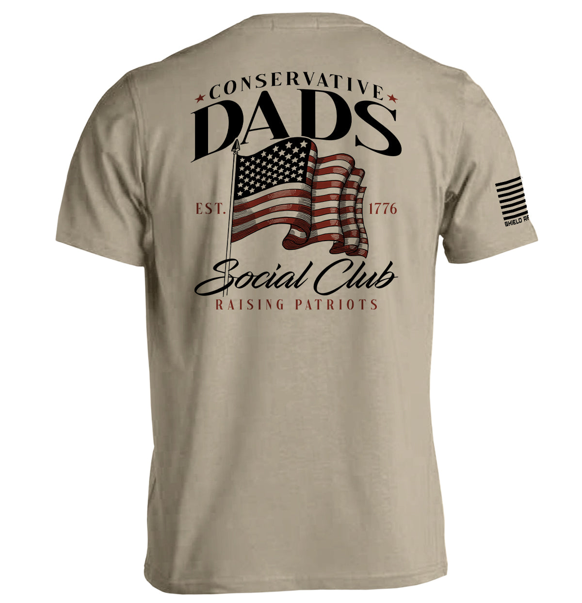 Conservative Dads Social Club T-Shirt featuring a patriotic design with an American flag and the words "Raising Patriots."