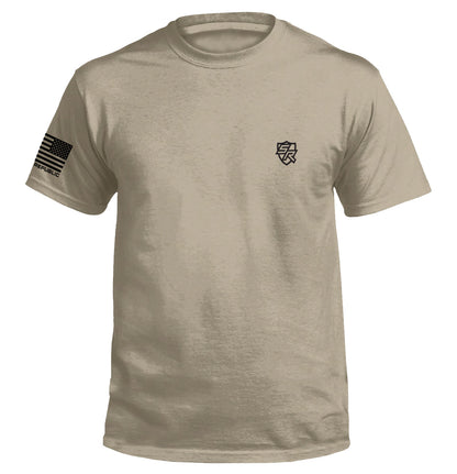 Beige t-shirt featuring small detailed artwork, inspired by American history with modern humor. Spilling the Tea Since 1773 T-Shirt