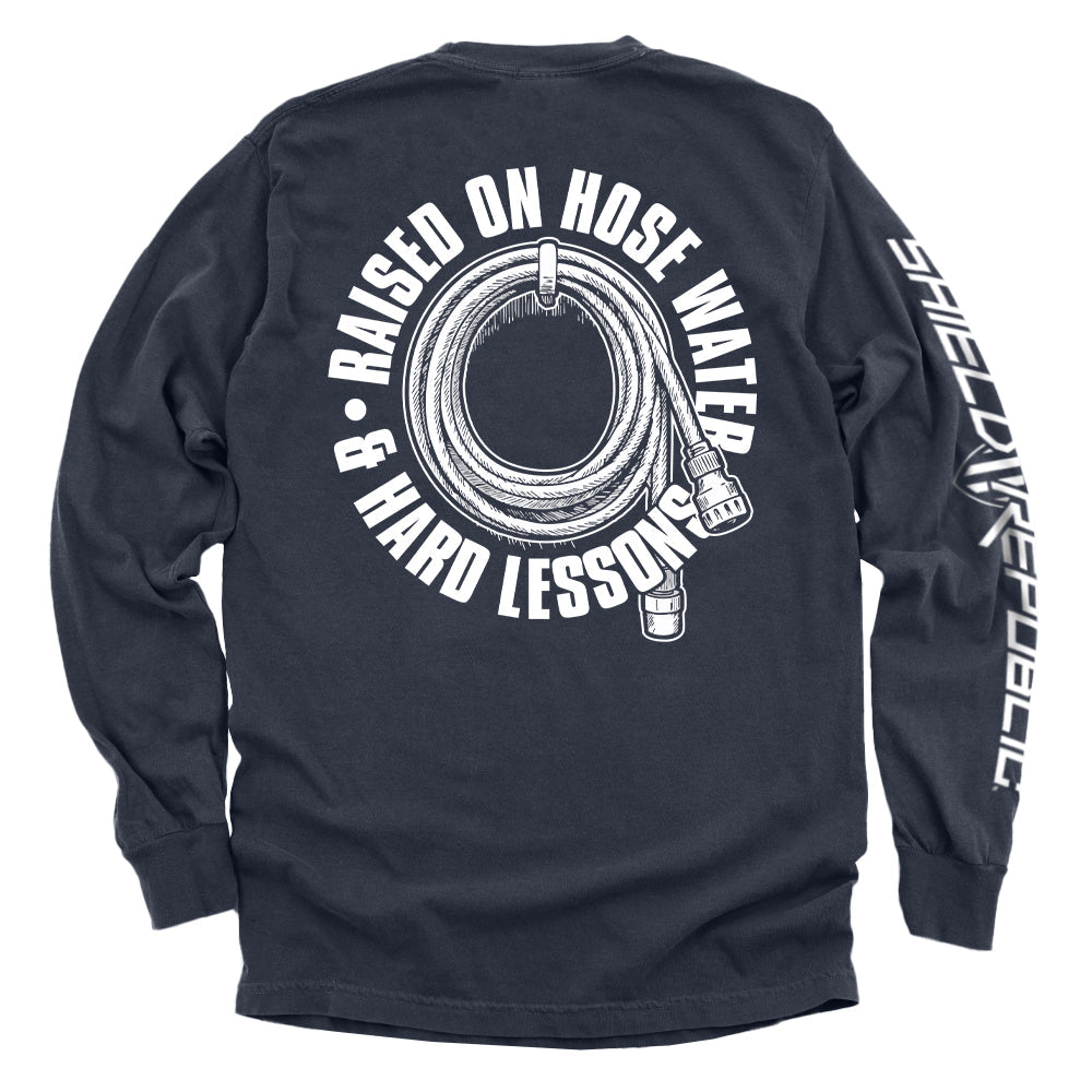 Back view of Raised On Hose Water & Hard Lessons Shirt with hose graphic, Blue Collar Nostalgia Tee.