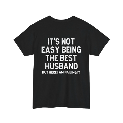 Not Easy Being the Best Husband Shirt – Black tee with humorous text for husbands.