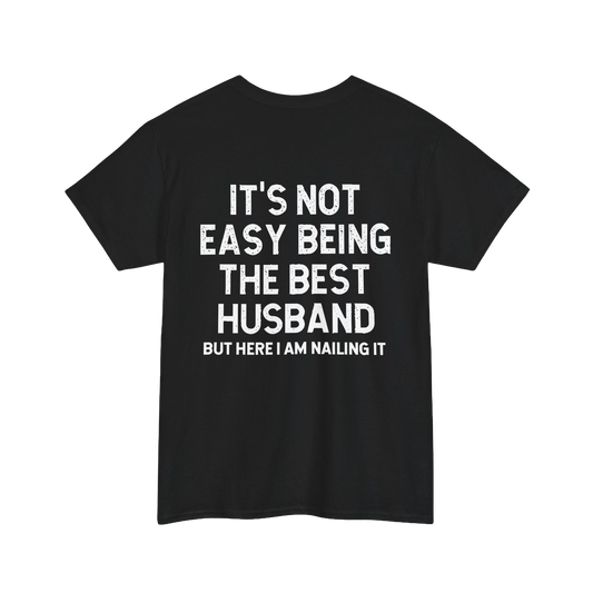 Not Easy Being the Best Husband Shirt – Black tee with humorous text for husbands.