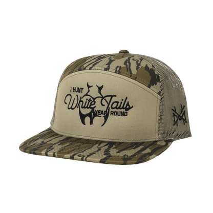 Camo and beige cap with hunting-themed text on a white background