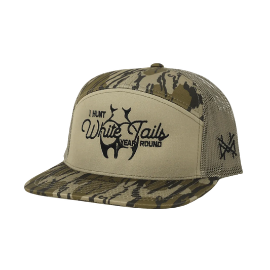Camo and beige cap with hunting-themed text on a white background