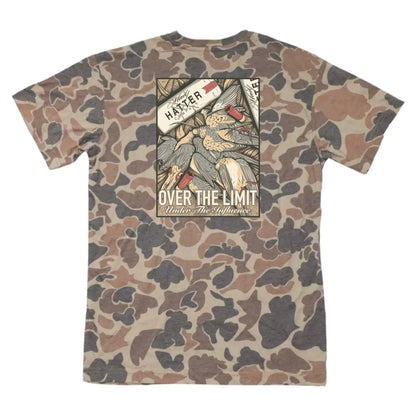 Over The Limit T Shirt featuring vintage-inspired illustration with bold artwork and muted colors, graphic statement tee on camouflage background.