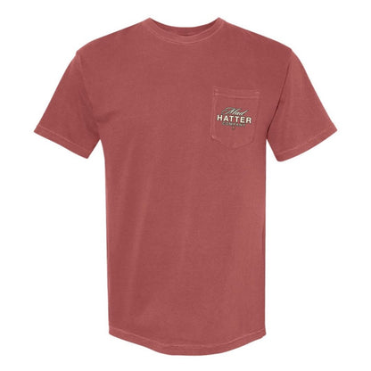 Dusty rose t-shirt with "Hatter" embroidered on the pocket