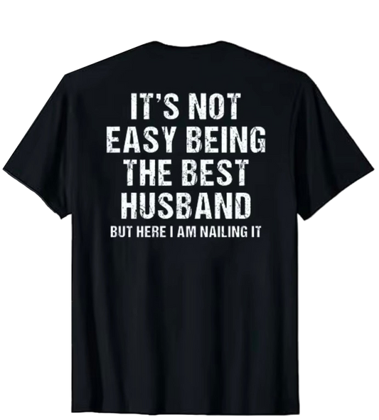 Black t-shirt with white text on a white background